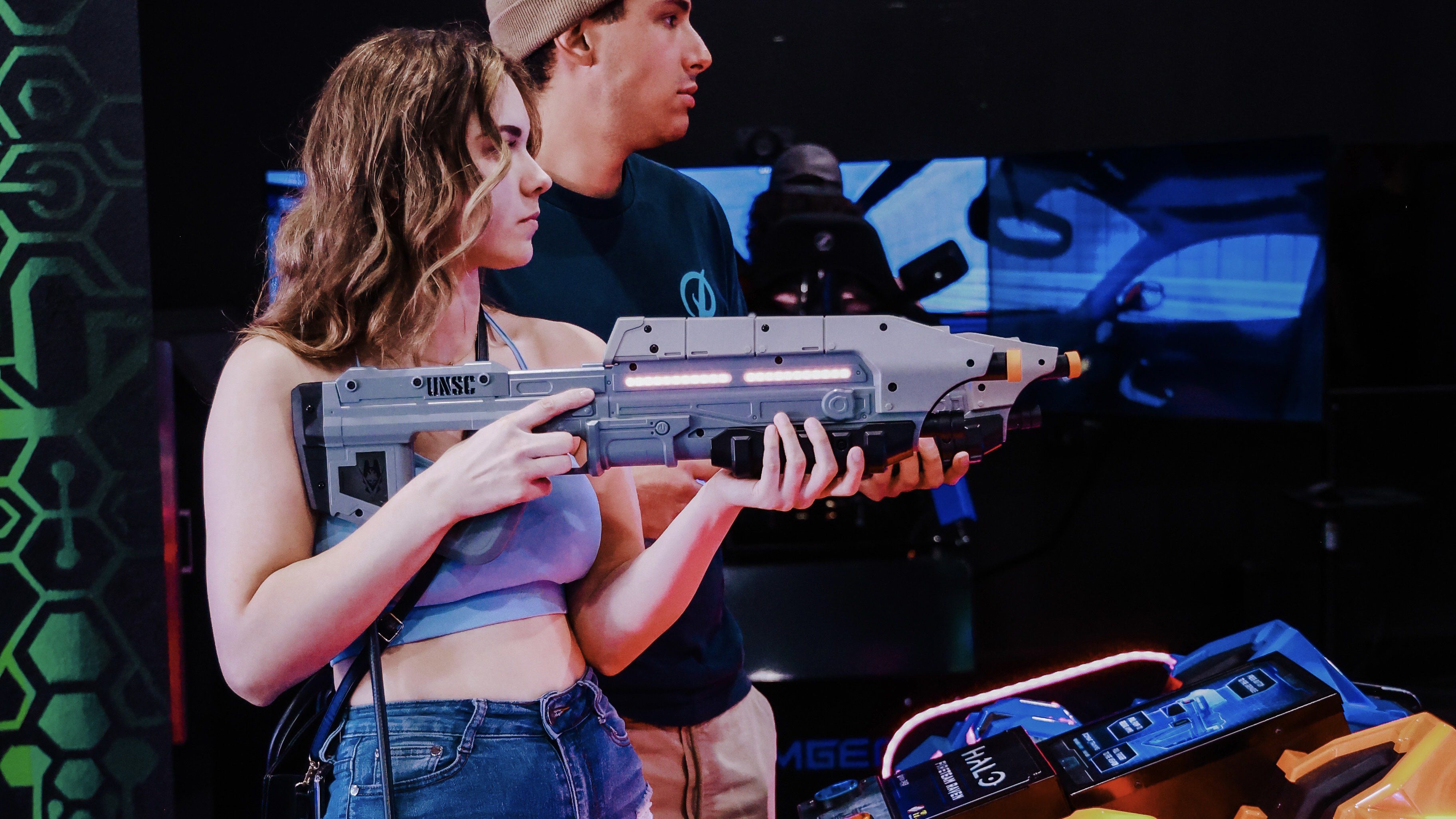 People playing an immersive shooting game