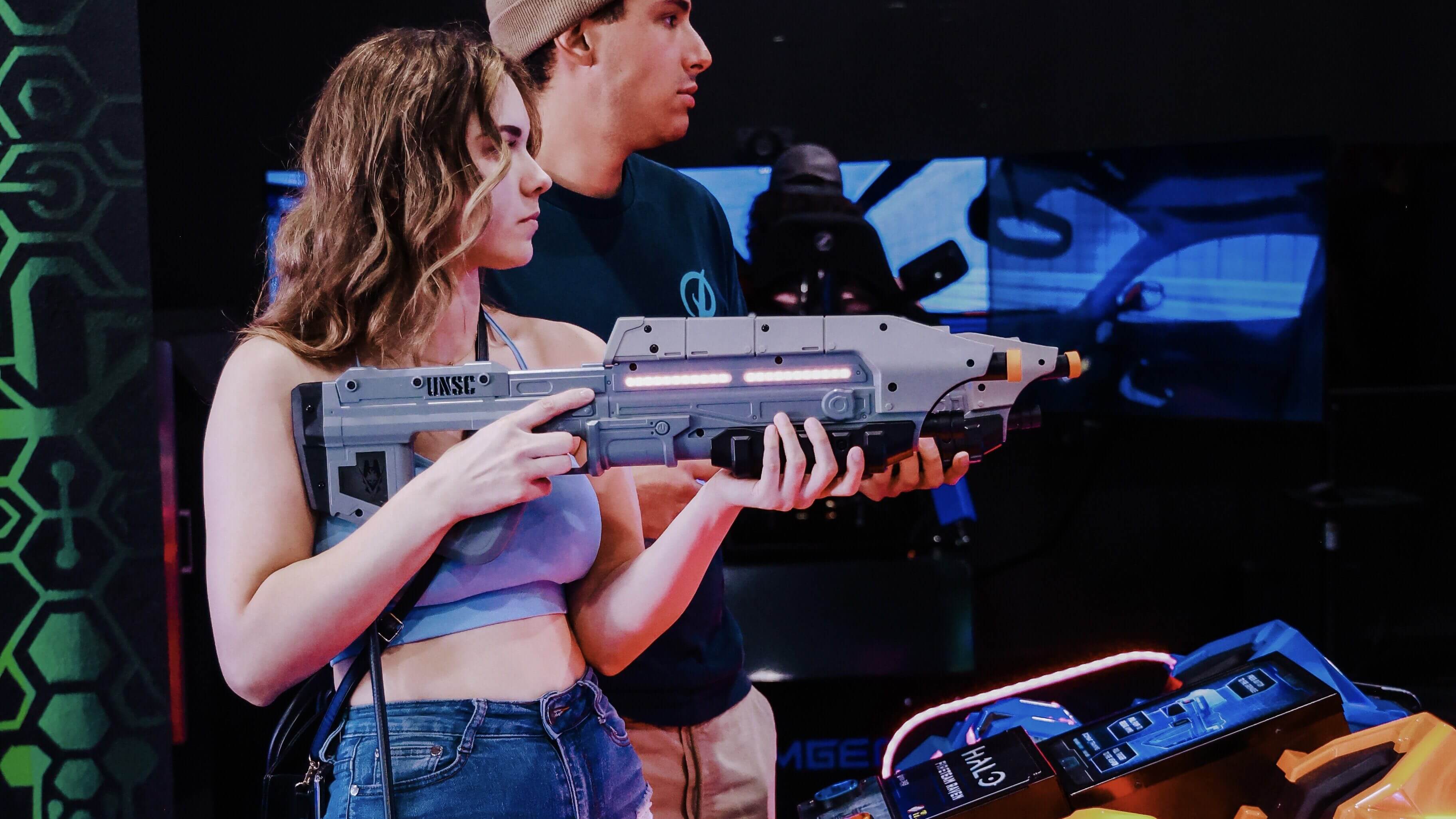 People playing an immersive shooting game